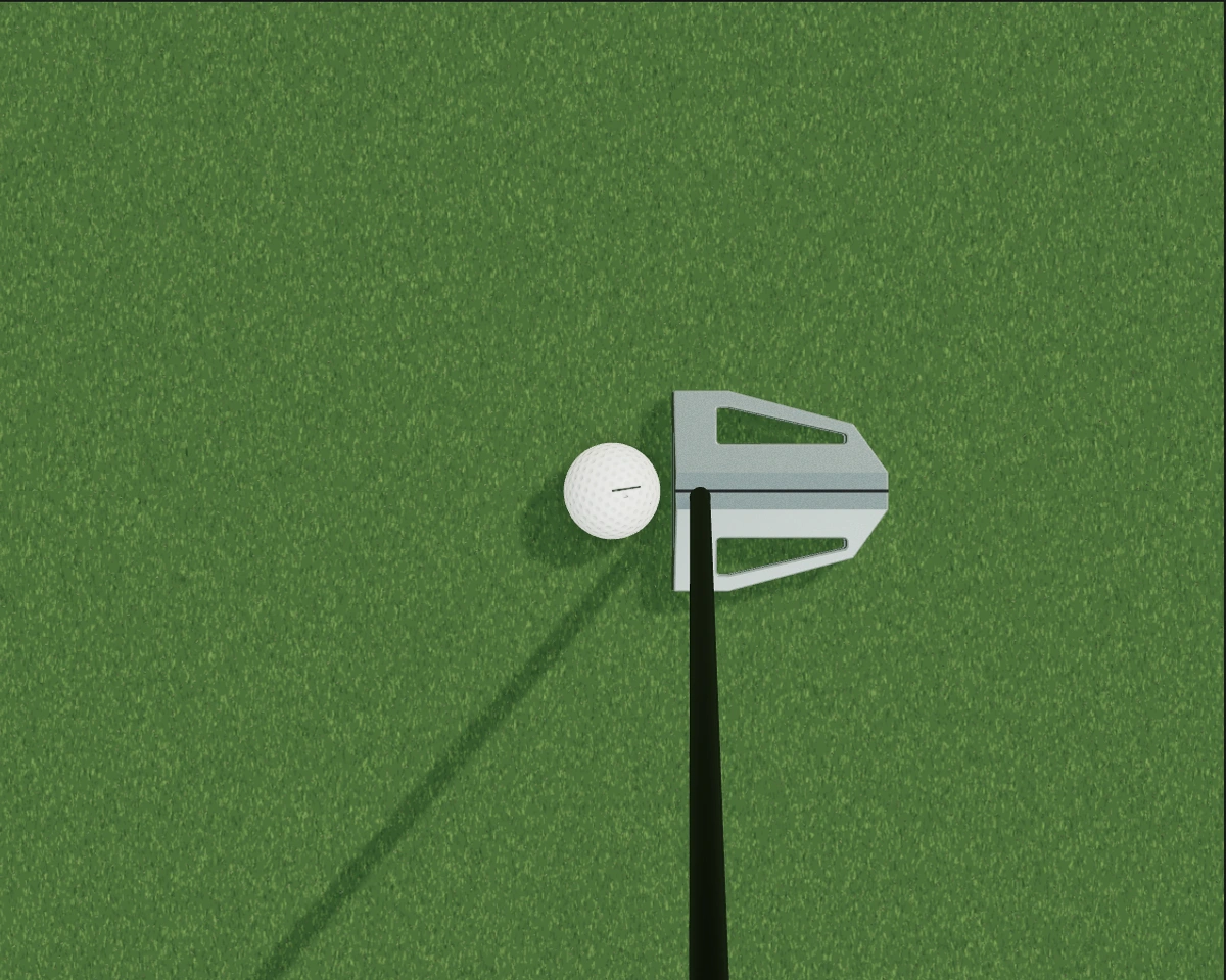 The golfer’s overhead view of the K1 on a putting green, with its black shaft toward the viewer and a golf ball centered at address